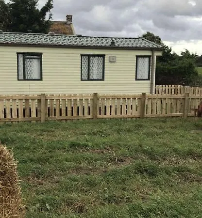 Feriegård Low Grange Caravan *